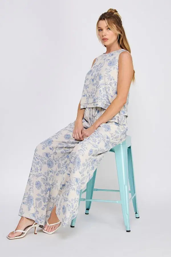 Woman’s floral print pajama set with elastic waist, perfect for women’s boho chic clothing from Shop Daisy