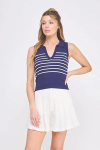 Woman wearing navy and white striped knit sleeveless polo tank top with V neck