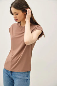 Bamboo cap sleeve basic round neck top worn by woman in stylish brown T-shirt