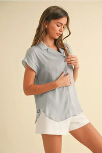 Woman’s BUTTON DOWN CAP SLEEVE SHIRT, a stylish and flattering cap sleeve shirt