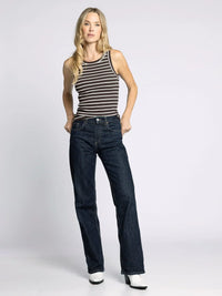 Woman wearing Edlin Basic Tank with striped pattern and dark wash jeans