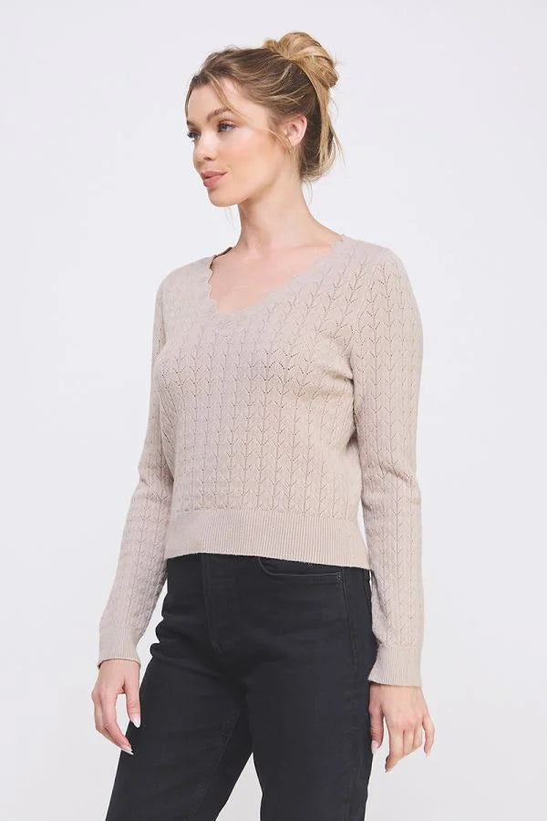 Women’s beige pullover sweater with scallop v-neck and textured pattern