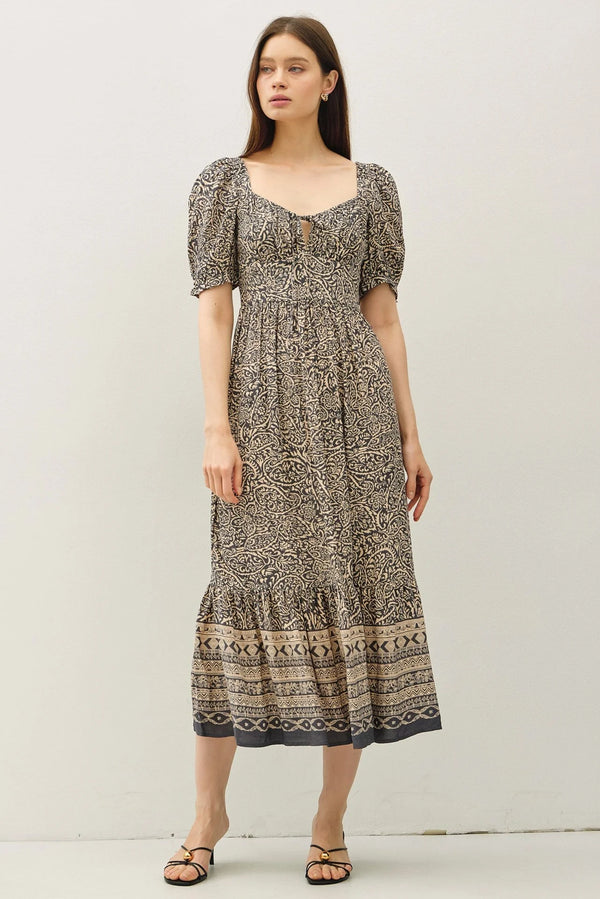 Women’s black and beige paisley border print midi dress with puff sleeves and ruffled hem