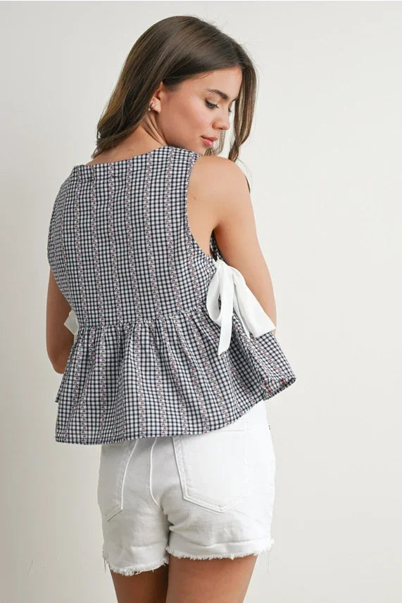 Women’s black and white gingham Sky Meadow Peplum blouse with shoulder ties