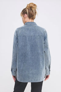 Blue corduroy shacket with oversized fit, collared button-down, perfect for casual wear
