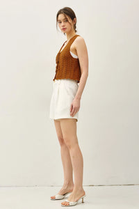 Women’s WAVY KNIT TIE FASTENING VEST with white shorts and heeled mules