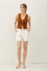 Women’s brown wavy knit tie fastening vest with deep V-neck and sleeveless design