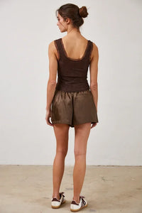 Women’s dark brown ribbed tank top with lace trim and matching faux leather shorts, featuring a mesh lace button design