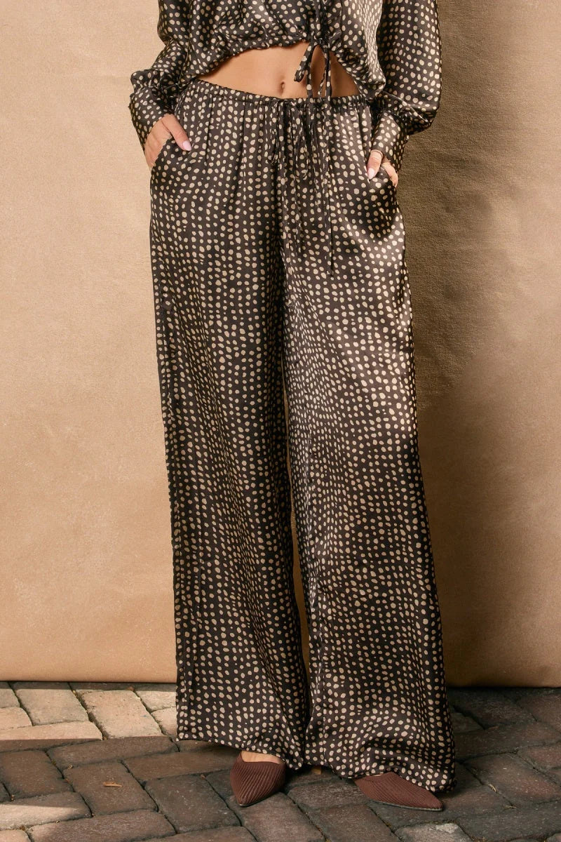 Women’s dark brown patterned sand pull drawstring pants with a relaxed fit