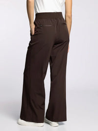 Women’s dark brown supply walker pants with elastic waist and zippered pockets