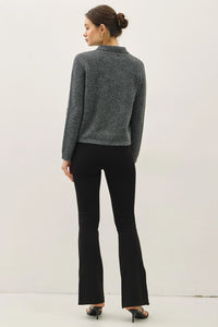 Women’s dark gray soft wool blend long-sleeved polo shirt with flare-leg pants and heels