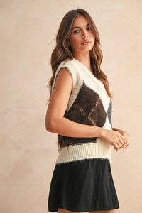 Women’s fuzzy argyle pattern sweater vest paired with a black skirt for a stylish look