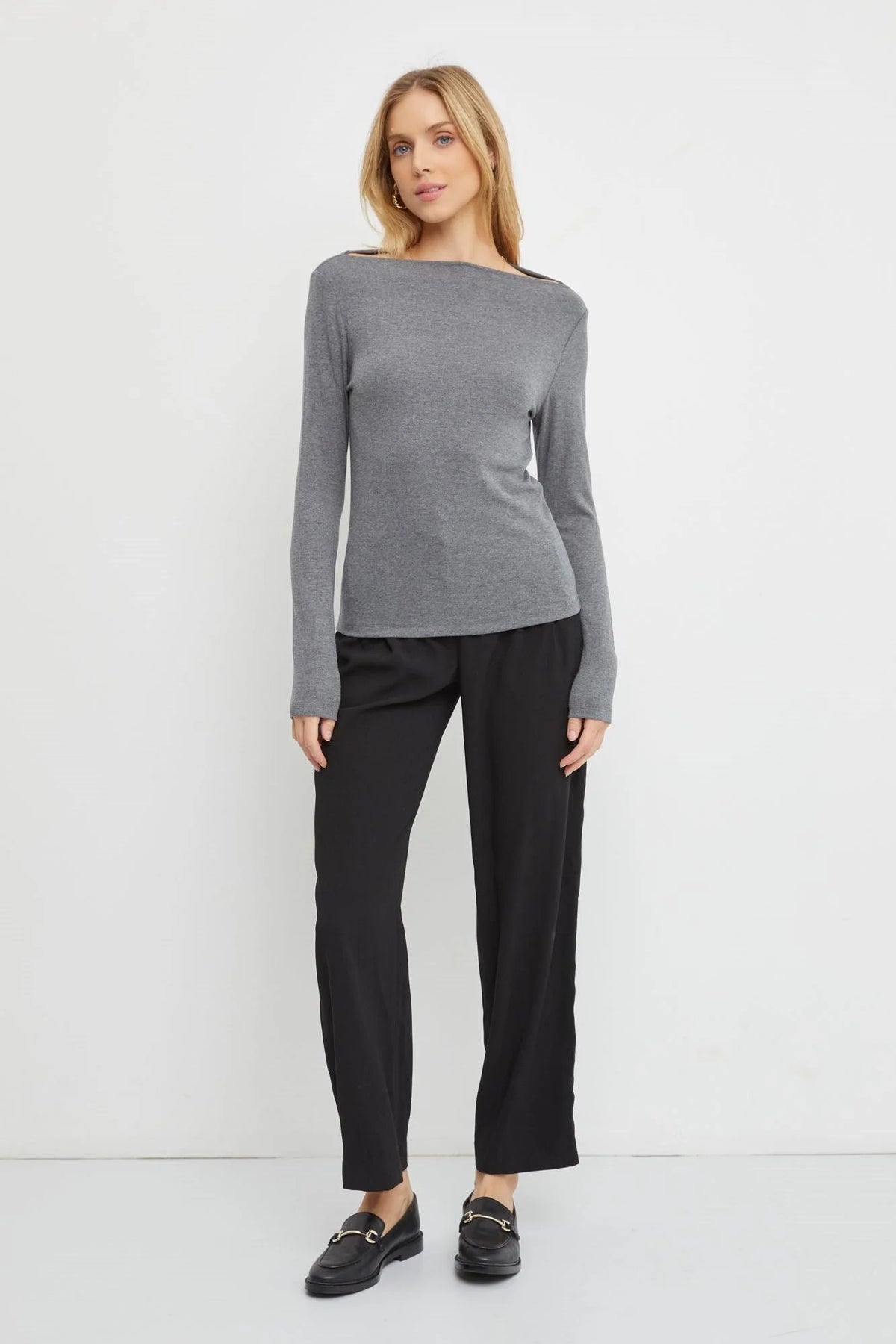 Women’s gray long sleeve knit top with basic boat neck and fitted silhouette