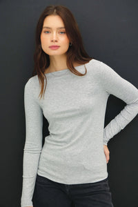Women’s light grey long sleeve knit top with basic boat neck and fitted silhouette