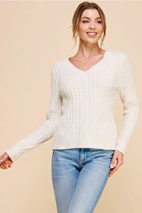 Women’s off-white soft cloud ribbed v-neck pullover sweater displayed in product image