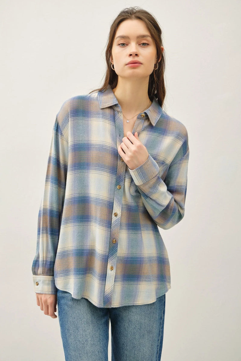 Vintage plaid boxy shirt for women in blue, brown, and cream fabric