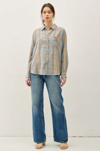Women’s classic cotton faded plaid shirt in grey and orange with wide-leg jeans and tan heels
