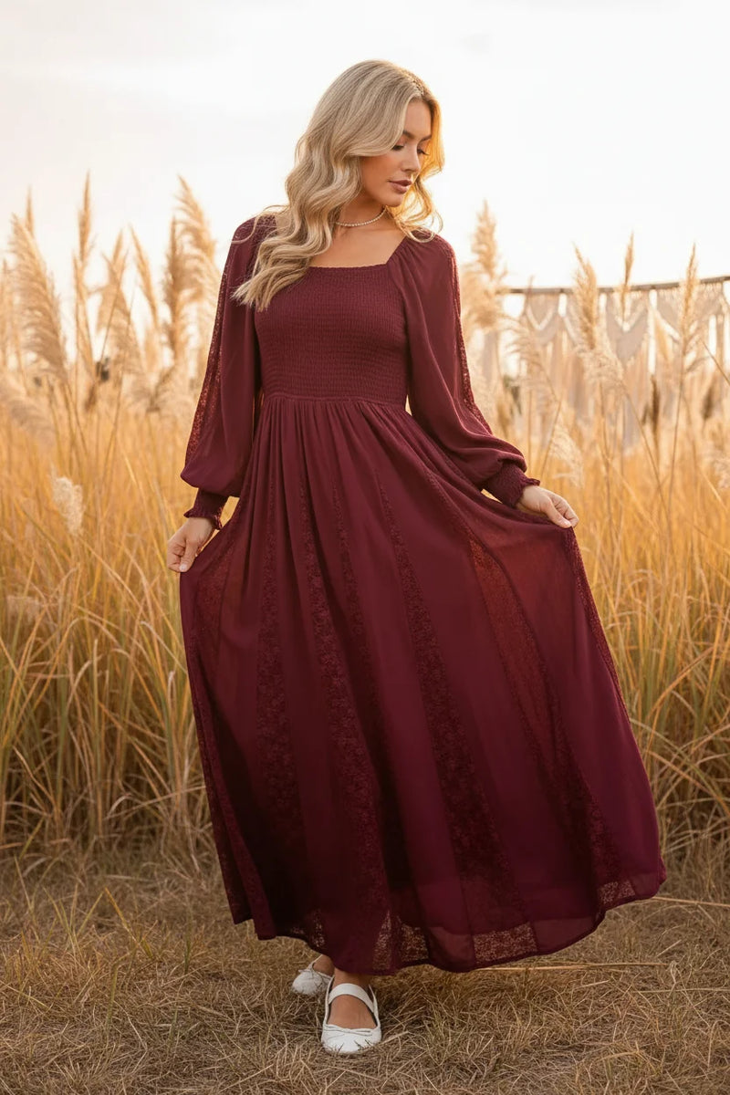 Women’s long-sleeved burgundy lace inset smocked maxi dress with textured pattern