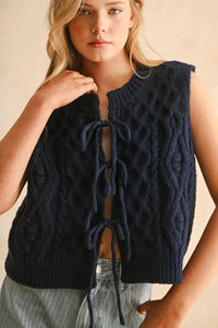 Women’s navy blue cable knitted vest with tie-front design, stylish knitted vest for women