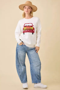 Women’s off-white long-sleeved sweatshirt with pumpkin truck embroidered patchwork design