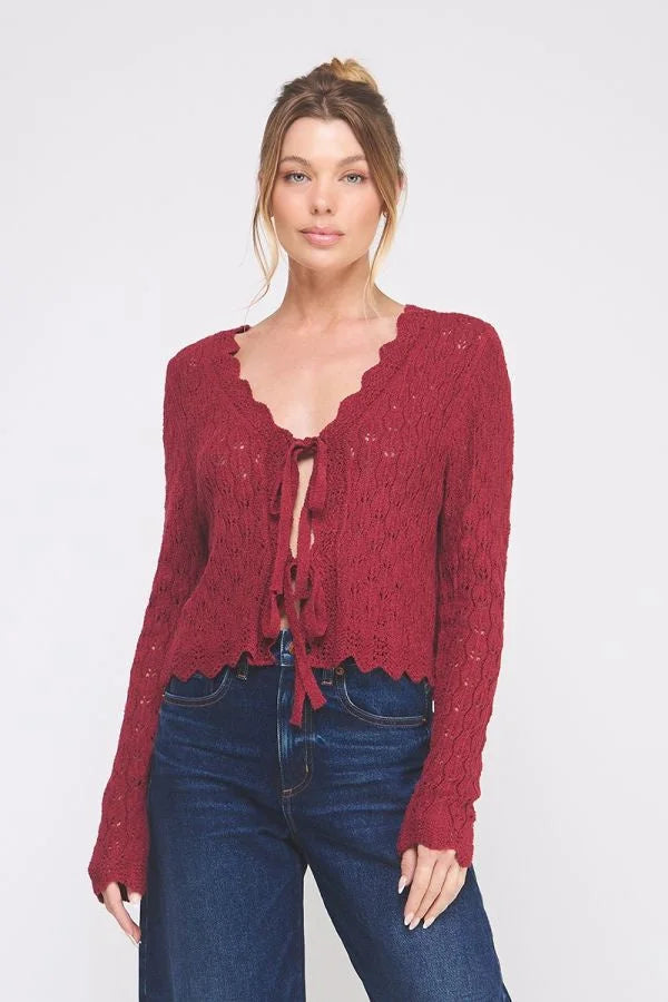 Women’s red long-sleeve tie cardigan with ruffled V-neckline, perfect for women’s boho chic clothing