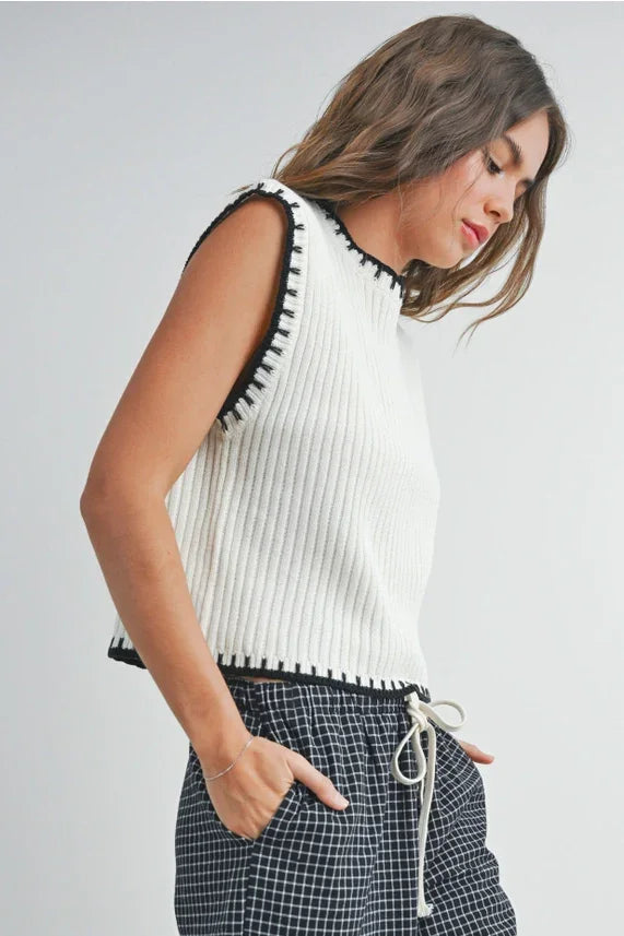 Women’s ribbed knit cap sleeve sweater vest with black contrast trim for a stylish look