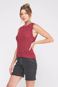Women’s sleeveless dark red crochet sweater vest with eyelet details for stylish layering