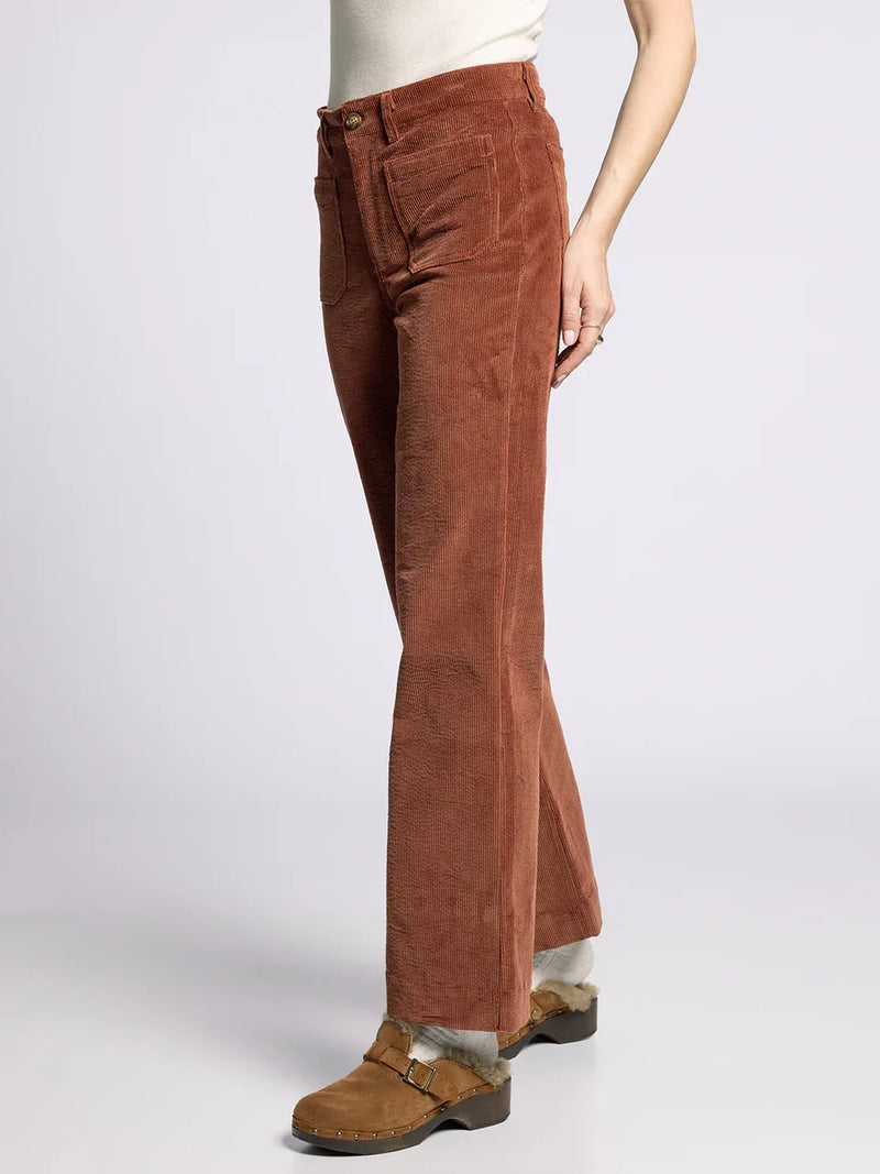 Women’s wide-leg brown corduroy Gladys Pants with high waist and brown clogs
