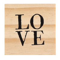 Wooden block with LOVE print featured in Treasure Box Earrings collection