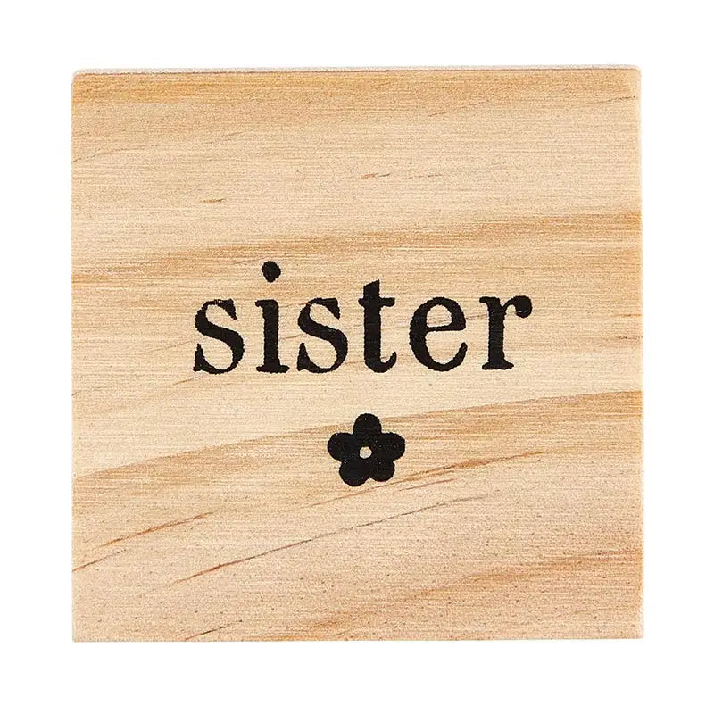 Wooden block engraved with sister and flower symbol for Treasure Box Earrings