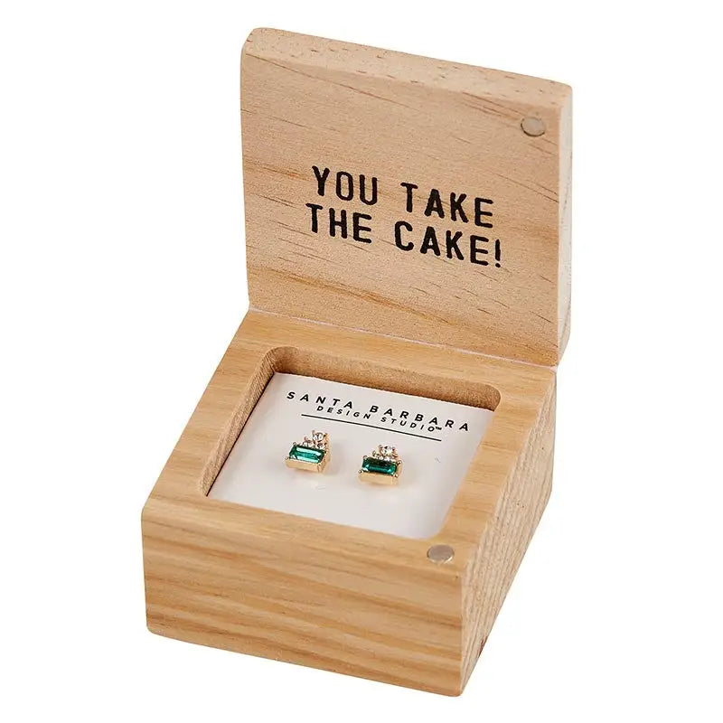 Wooden treasure box containing YOU TAKE THE CAKE box earrings for HBD celebration