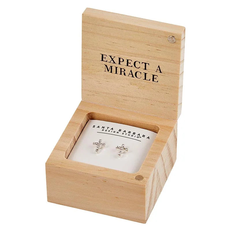 Wooden treasure box containing box earrings engraved with EXPECT A MIRACLE