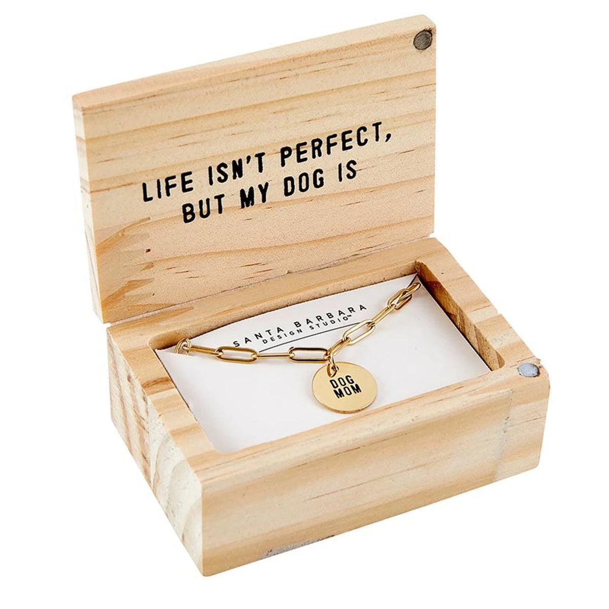 Wooden box showcasing a gold bracelet and gold disc charm from the LINK NECKLACE - DOG MOM