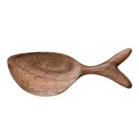 Acacia Wood Fish Shaped Dish elegantly displayed, perfect for serving seafood delicacies