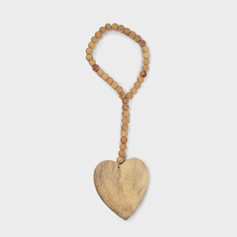 Wooden heart and wood bead necklace showcasing boho style in SMALL HEART ANTIQUED WOOD BEAD STRAND