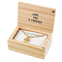 Wooden jewelry box with LOVE YOU X FOREVER text and gold charm bracelet for link necklace