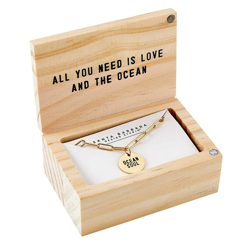 Wooden jewelry box with All You Need Is Love And The Ocean text featuring Gold Chain Ocean Soul Necklace