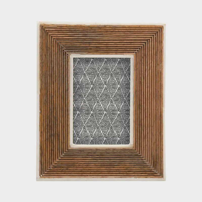 Hand-carved photo frame with bone border and geometric pattern in mango wood