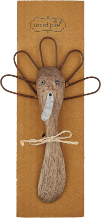 Thanksgiving butter spreader with wooden handle resembling a turkey for holiday table settings