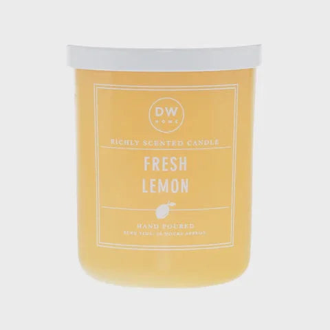 Yellow DW Fresh Lemon scented candle in glass jar featured at Shop Daisy