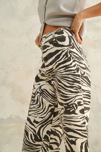 Zebra print stretch wide-leg pants showcasing stylish zebra print stretch design