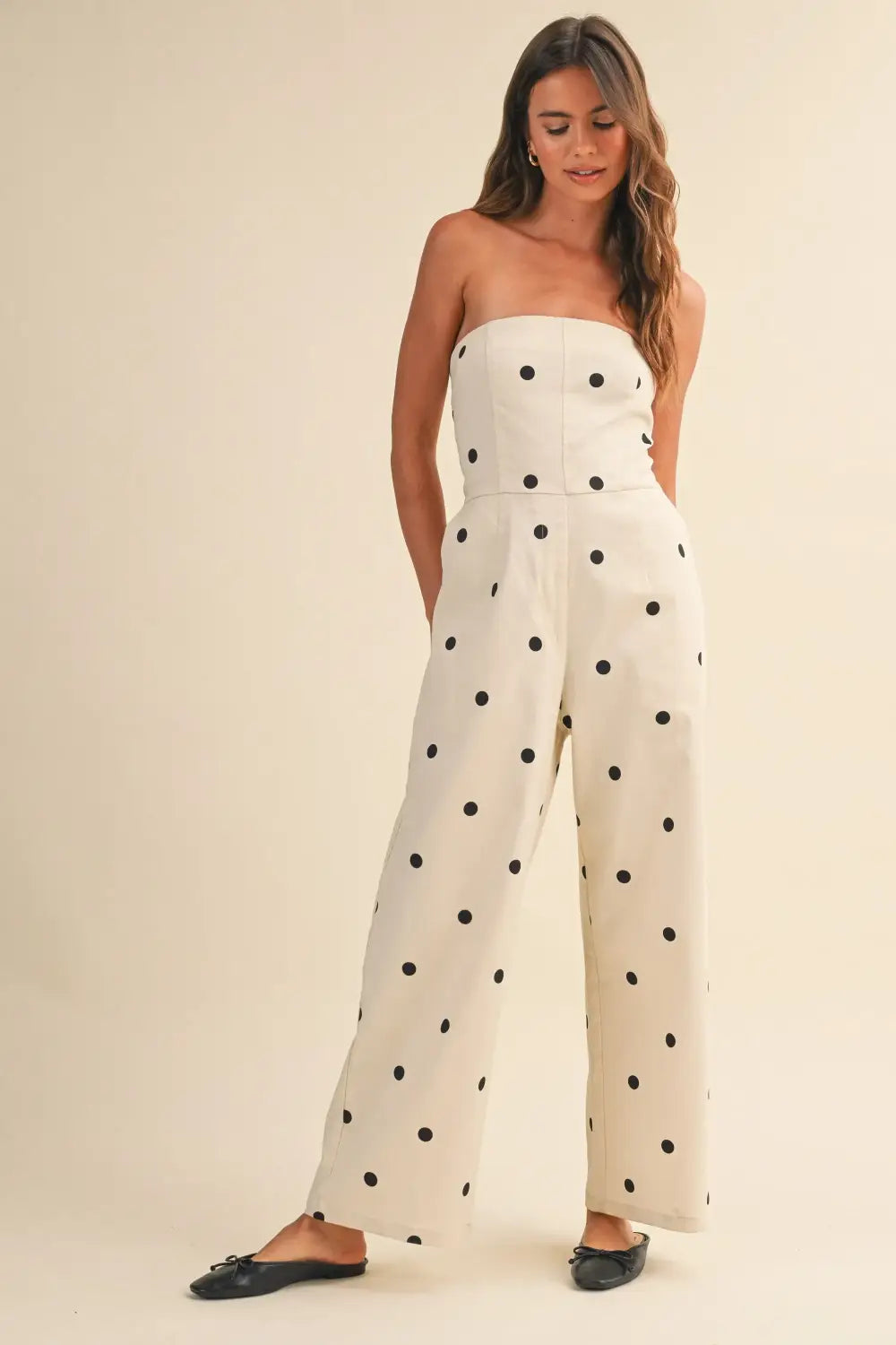 The jumpsuit that does it all: our polka dot strapless wide