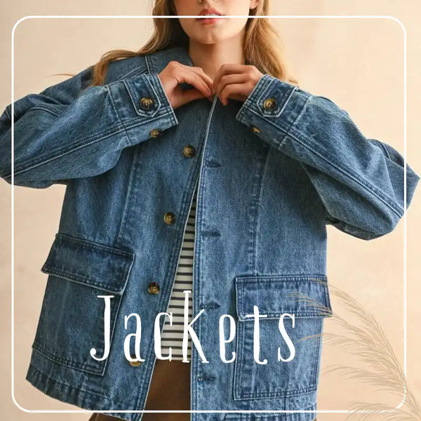 A woman wearing a blue denim jacket with brown buttons and front pockets over a striped shirt.